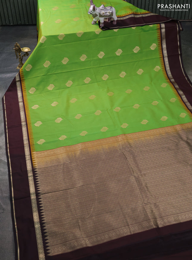 Semi kanchipuram silk saree light green and coffee brown with zari woven buttas and temple design rettapet zari woven border