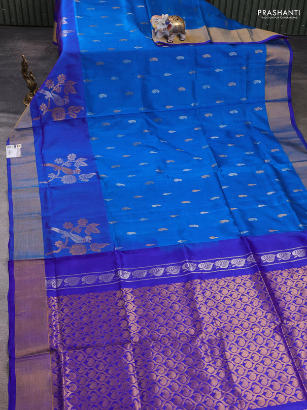 Pure uppada silk saree cs blue and blue with allover silver & zari woven buttas and parrot design zari woven border