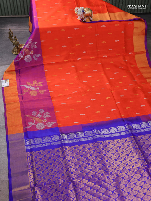 Pure uppada silk saree orange and royal blue with allover silver & zari woven buttas and parrot design zari woven border