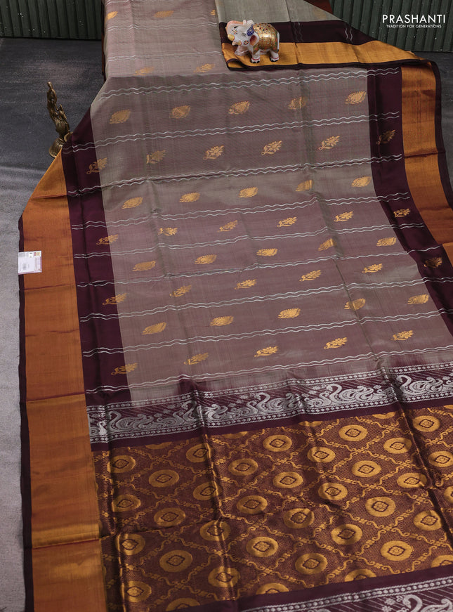 Pure uppada silk saree pastel brown and coffee brown with allover silver weaves & zari woven buttas and long zari woven border
