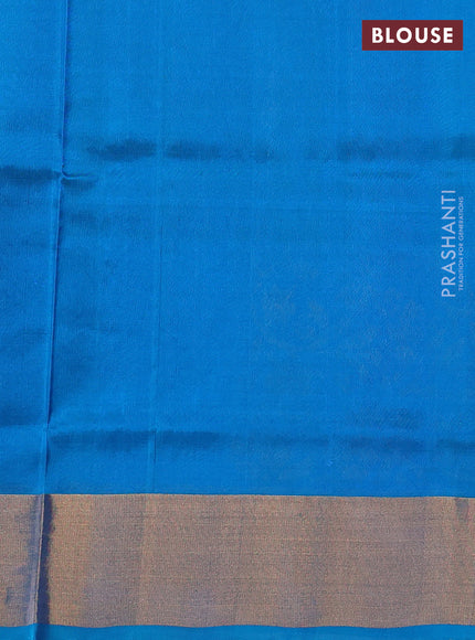 Pure uppada silk saree dual shade of teal green and teal blue with allover silver & zari woven buttas and long zari woven border