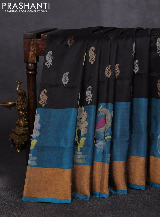 Pure uppada silk saree black and peacock blue with allover silver & zari woven buttas and peacock design zari woven border