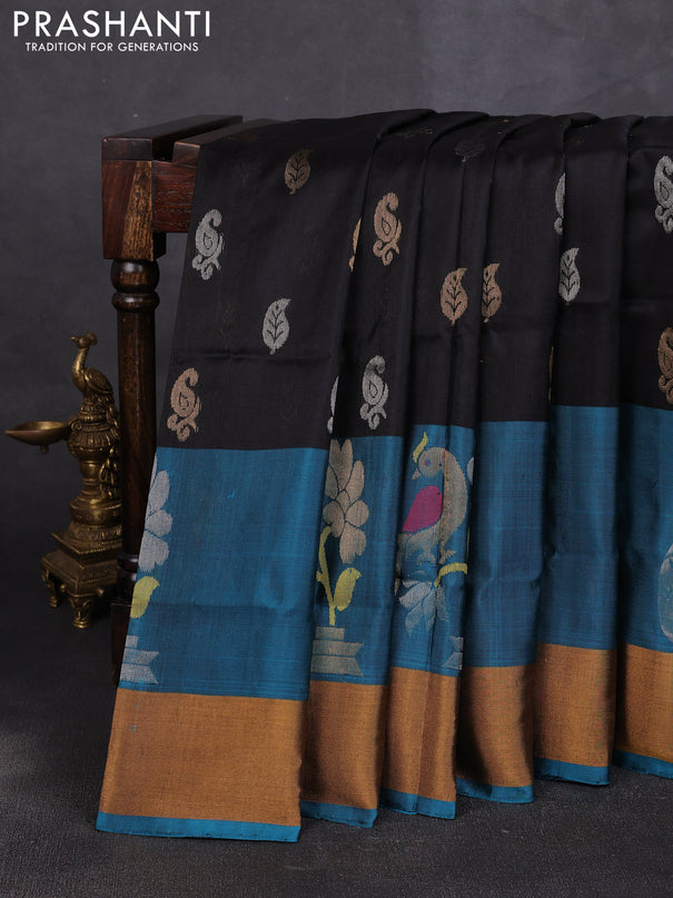 Pure uppada silk saree black and peacock blue with allover silver & zari woven buttas and peacock design zari woven border