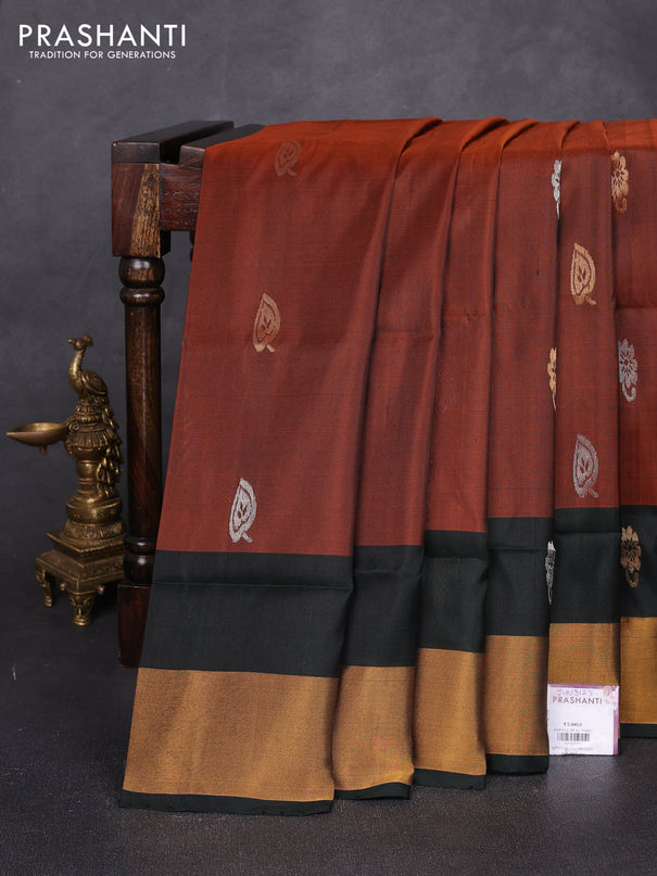 Pure uppada silk saree rustic orange and bottle green with allover silver & zari woven buttas and zari woven border