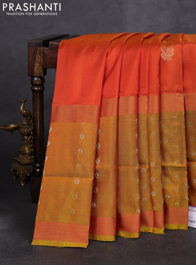 Pure uppada silk saree orange and mustard green with allover silver zari woven buttas and zari woven border
