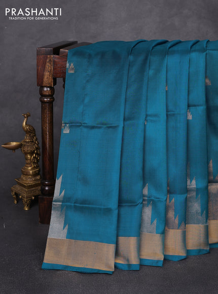 Pure uppada silk saree peacock blue with allover silver & zari woven buttas and temple zari woven border