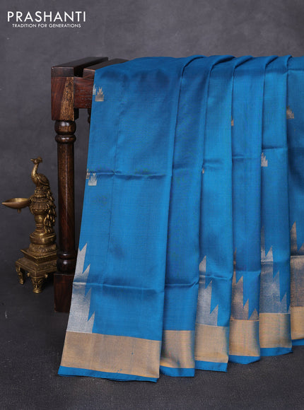Pure uppada silk saree peacock blue with allover silver & zari woven buttas and temple zari woven border