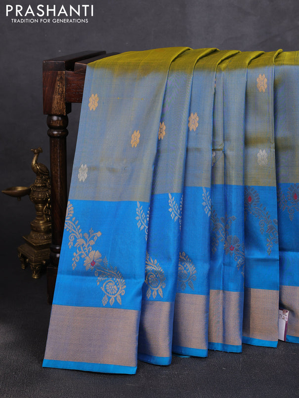Pure uppada silk saree dual shade of bluish yellow and cs blue with allover silver & zari woven buttas and zari woven butta border