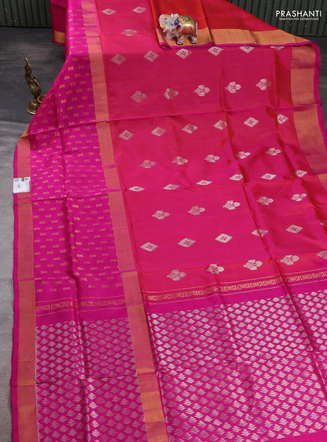 Pure uppada silk saree dual shade of pinkish orange and pink with allover zari woven buttas and long zari woven butta border