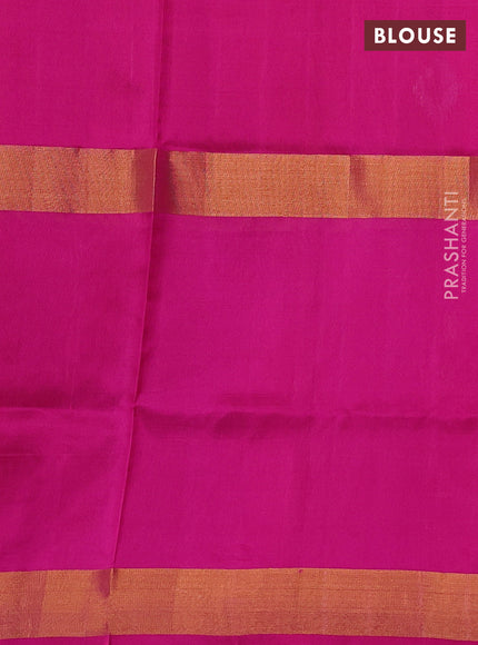 Pure uppada silk saree dual shade of pinkish orange and pink with allover zari woven buttas and long zari woven butta border