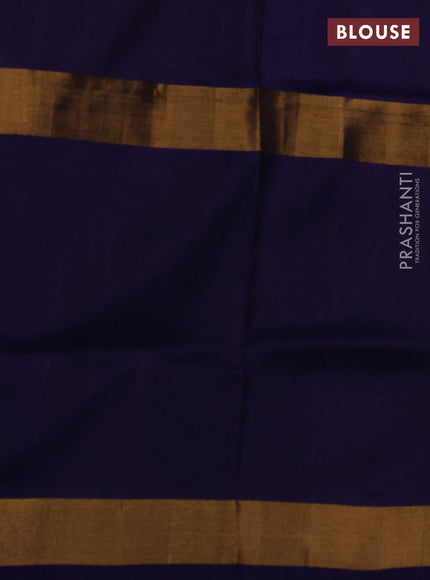 Pure uppada silk saree dual shade of bluish pink and violet with allover zari woven buttas and zari woven border