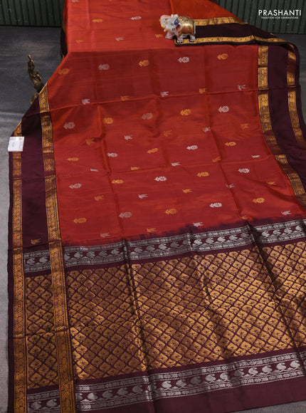 Pure uppada silk saree rust shade and deep maroon with allover silver & zari woven buttas and rettapet zari woven butta border
