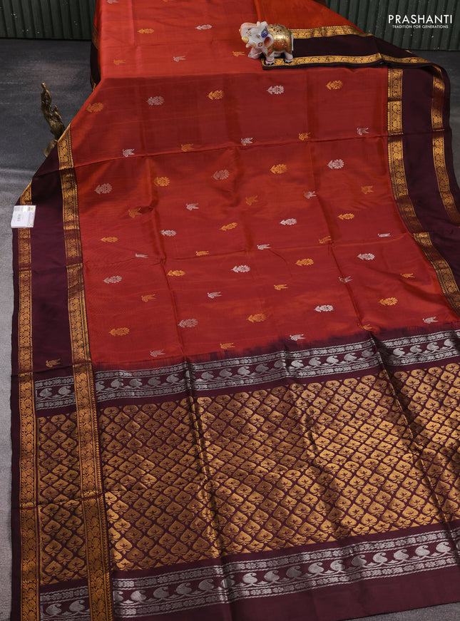 Pure uppada silk saree rust shade and deep maroon with allover silver & zari woven buttas and rettapet zari woven butta border