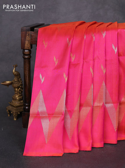 Pure uppada silk saree dual shade of pinkish orange with allover silver & zari woven buttas and long zigzag zari woven border