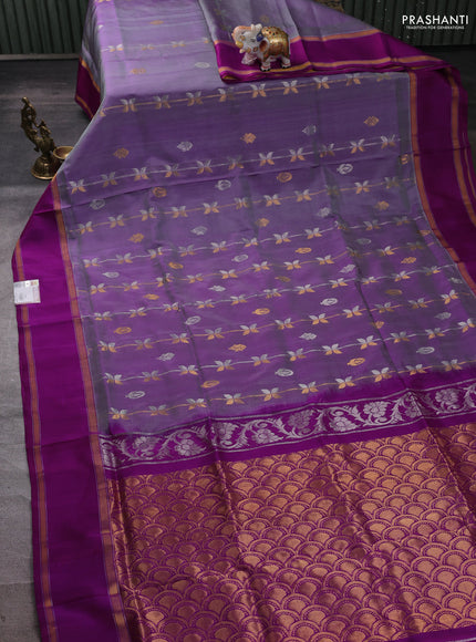 Pure uppada silk saree dual shade of purple and magenta pink with allover zari weaves & buttas and rettapet zari woven border