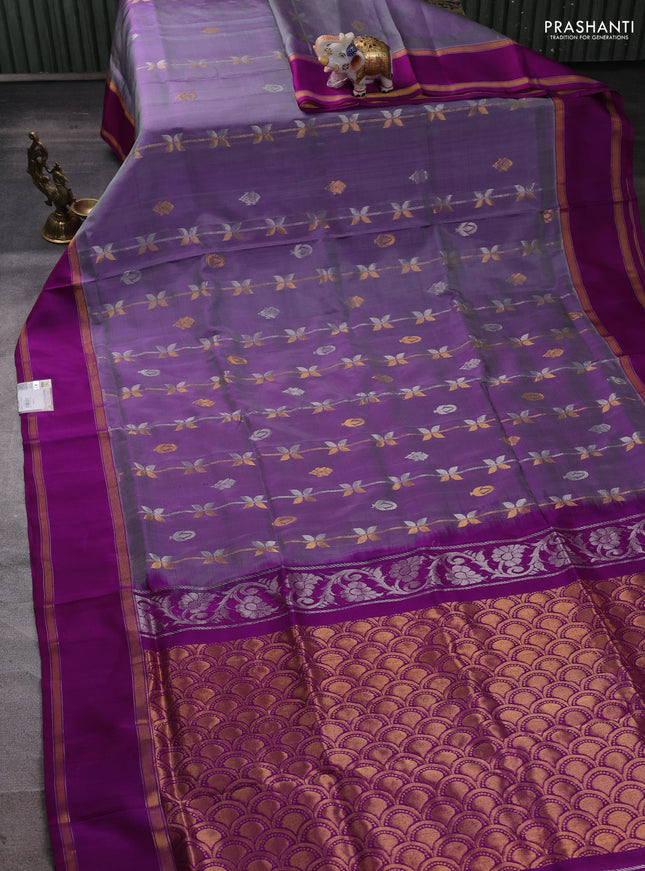 Pure uppada silk saree dual shade of purple and magenta pink with allover zari weaves & buttas and rettapet zari woven border