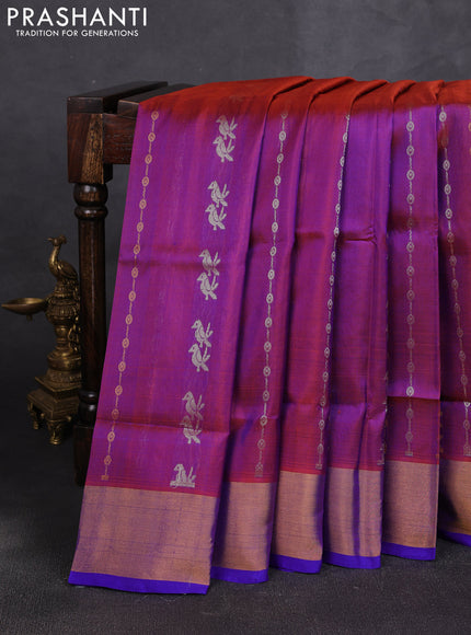 Pure uppada silk saree dual shade of rust shade and royal blue with allover zari weaves & buttas and zari woven border
