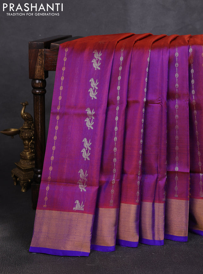 Pure uppada silk saree dual shade of rust shade and royal blue with allover zari weaves & buttas and zari woven border