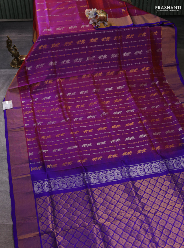Pure uppada silk saree dual shade of rust shade and royal blue with allover zari weaves & buttas and zari woven border
