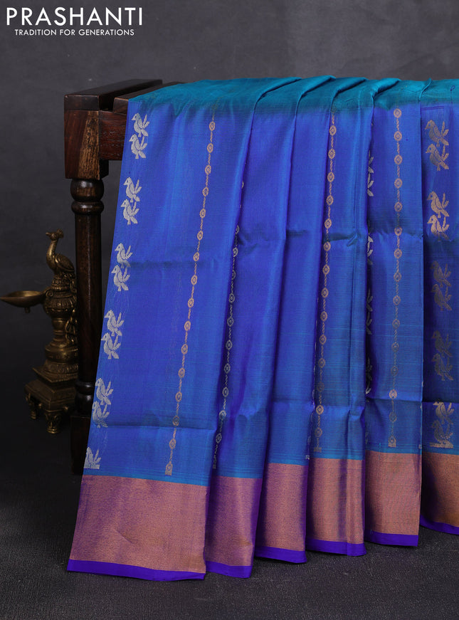 Pure uppada silk saree dual shade of greenish blue and royal blue with allover silver & zari weaves & buttas and zari woven border