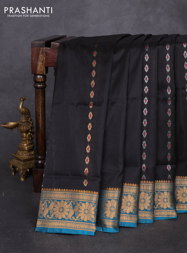 Pure uppada silk saree black and peacock blue with allover silver & zari woven buttas and zari woven border