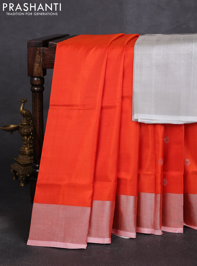 Pure uppada silk saree orange with allover zari woven buttas and zari woven border