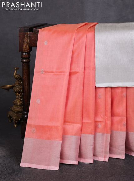 Pure uppada silk saree peach orange with allover zari woven buttas and zari woven border