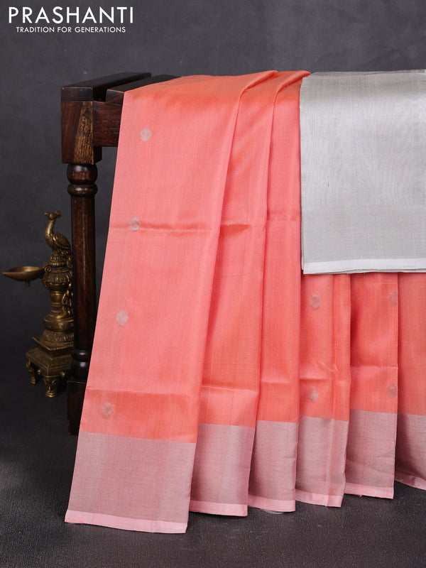 Pure uppada silk saree peach orange with allover zari woven buttas and zari woven border