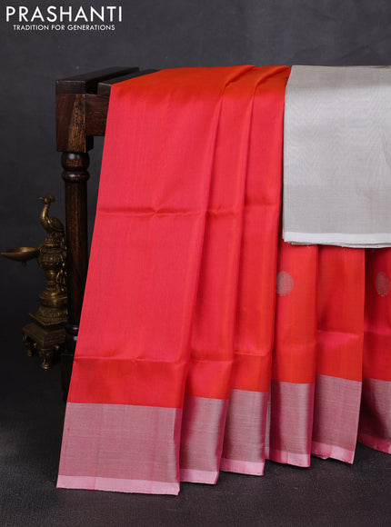Pure uppada silk saree dual shade of pinkish orange with allover silver coin buttas and zari woven border