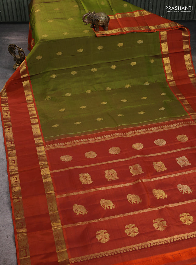 Pure kanchipuram silk saree mehendi green and rust shade with zari woven buttas and long rettapet zari woven border