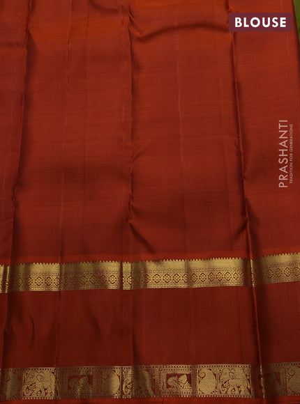 Pure kanchipuram silk saree mehendi green and rust shade with zari woven buttas and long rettapet zari woven border