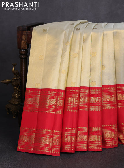 Pure kanchipuram silk saree beige and red with zari woven buttas and long rettapet zari woven border