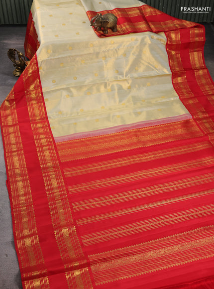 Pure kanchipuram silk saree beige and red with zari woven buttas and long rettapet zari woven border