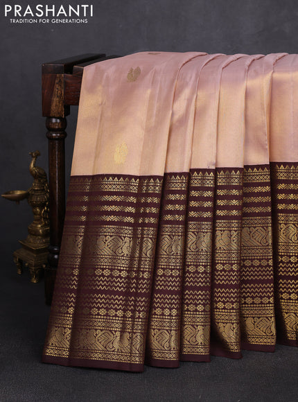 Pure kanchipuram silk saree mild peach and coffee brown with zari woven buttas and long zari woven border