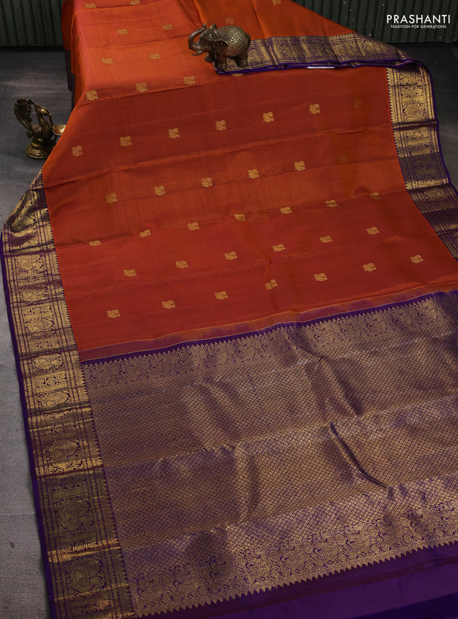 Pure kanchipuram silk saree rust shade and purple with zari woven buttas and rich zari woven border