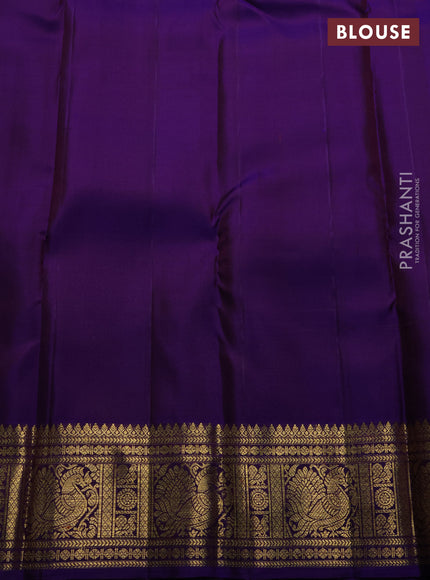 Pure kanchipuram silk saree rust shade and purple with zari woven buttas and rich zari woven border