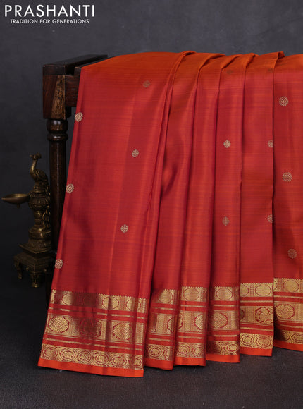 Pure kanchipuram silk saree rust shade with zari woven buttas and rich zari woven border