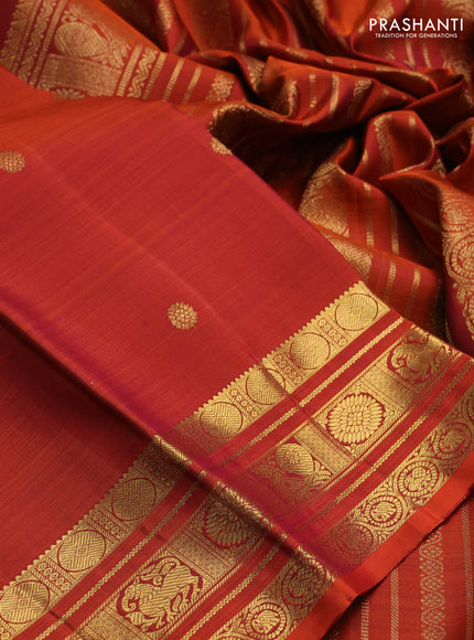 Pure kanchipuram silk saree rust shade with zari woven buttas and rich zari woven border