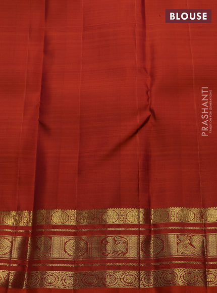 Pure kanchipuram silk saree rust shade with zari woven buttas and rich zari woven border