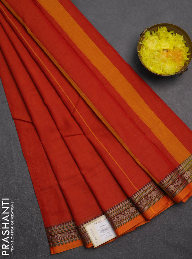 Narayanpet cotton saree sunset orange with plain body and temple design thread woven border