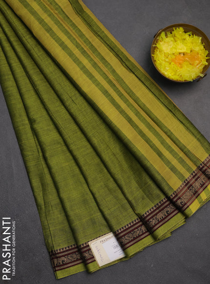 Narayanpet cotton saree light green with plain body and temple design thread woven border