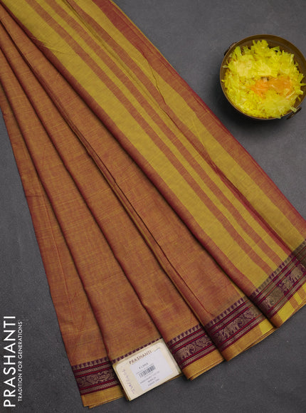 Narayanpet cotton saree dark mustard with plain body and temple design thread woven border
