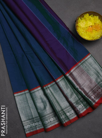 Narayanpet cotton saree dual shade of bluish green and rust shade with plain body and long silver zari woven border
