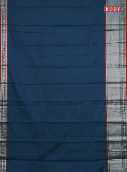 Narayanpet cotton saree dual shade of bluish green and rust shade with plain body and long silver zari woven border
