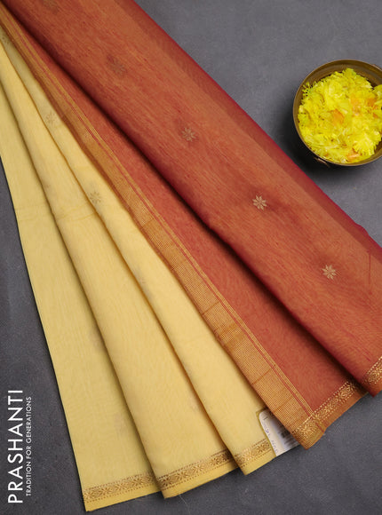 Semi maheswari cotton saree pale yellow and maroon shade with zari woven buttas and small zari woven border