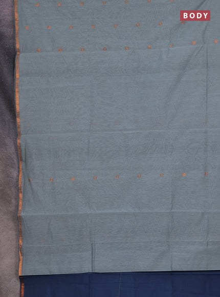 Semi maheswari cotton saree pastel green and grey shade with copper zari woven buttas and small copper zari woven border