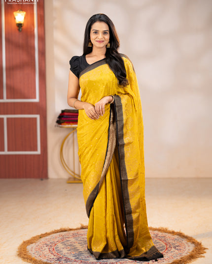 Banarasi chiffon saree mustard yellow and black with allover thread & zari woven buttas and woven border