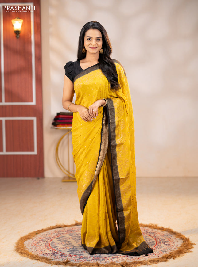 Banarasi chiffon saree mustard yellow and black with allover thread & zari woven buttas and woven border