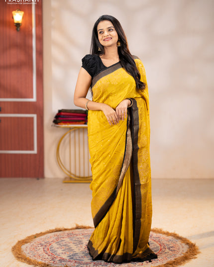 Banarasi chiffon saree mustard yellow and black with allover thread & zari woven buttas and woven border
