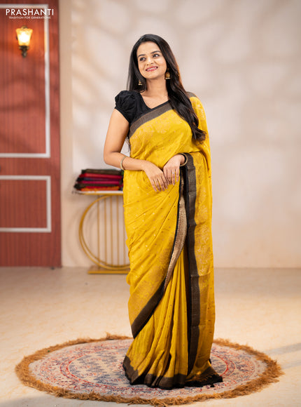Banarasi chiffon saree mustard yellow and black with allover thread & zari woven buttas and woven border
